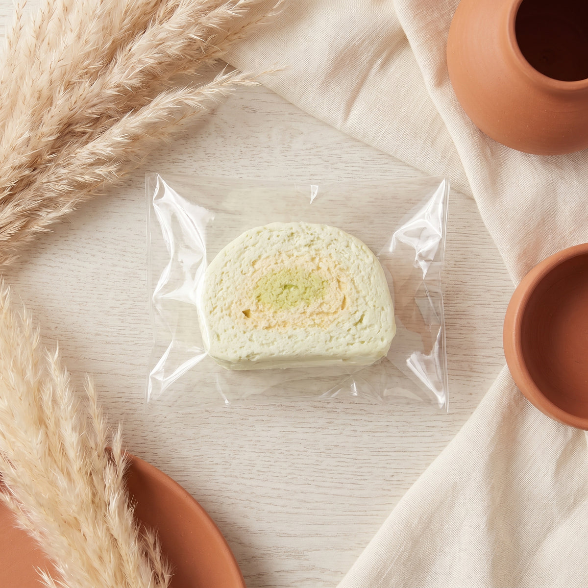 Rock melon steamed bun slice TABA squishy with dough texture and pale orange tint, handmade moderate rising stress relief squishy Australia Sydney