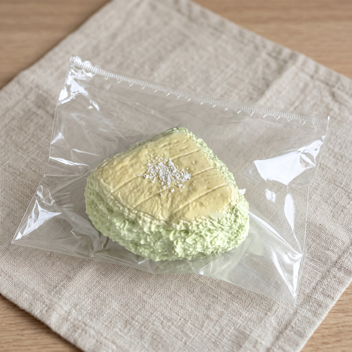 Rock melon triangle cream bun TABA squishy with soft butter texture and orange melon cream filling, handmade extra slow rising stress relief squishy Australia Sydney