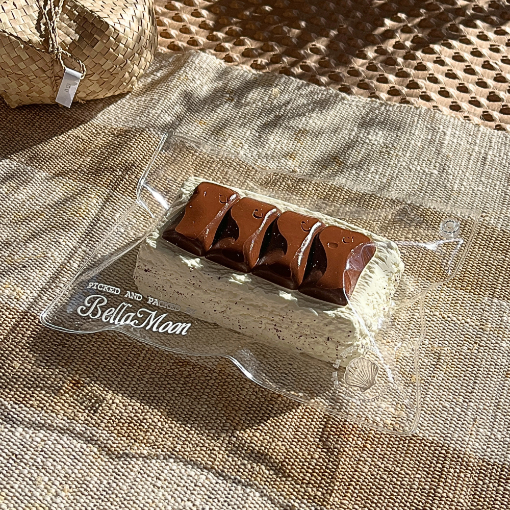 Chocolate brown silky cream bar squishy with Greek yogurt texture and extra-slow rise for luxurious stress relief