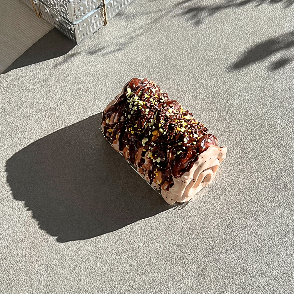 Chocolate brown pistachio diplomat cream squishy fidget toy with moderate bounce for stress relief therapy