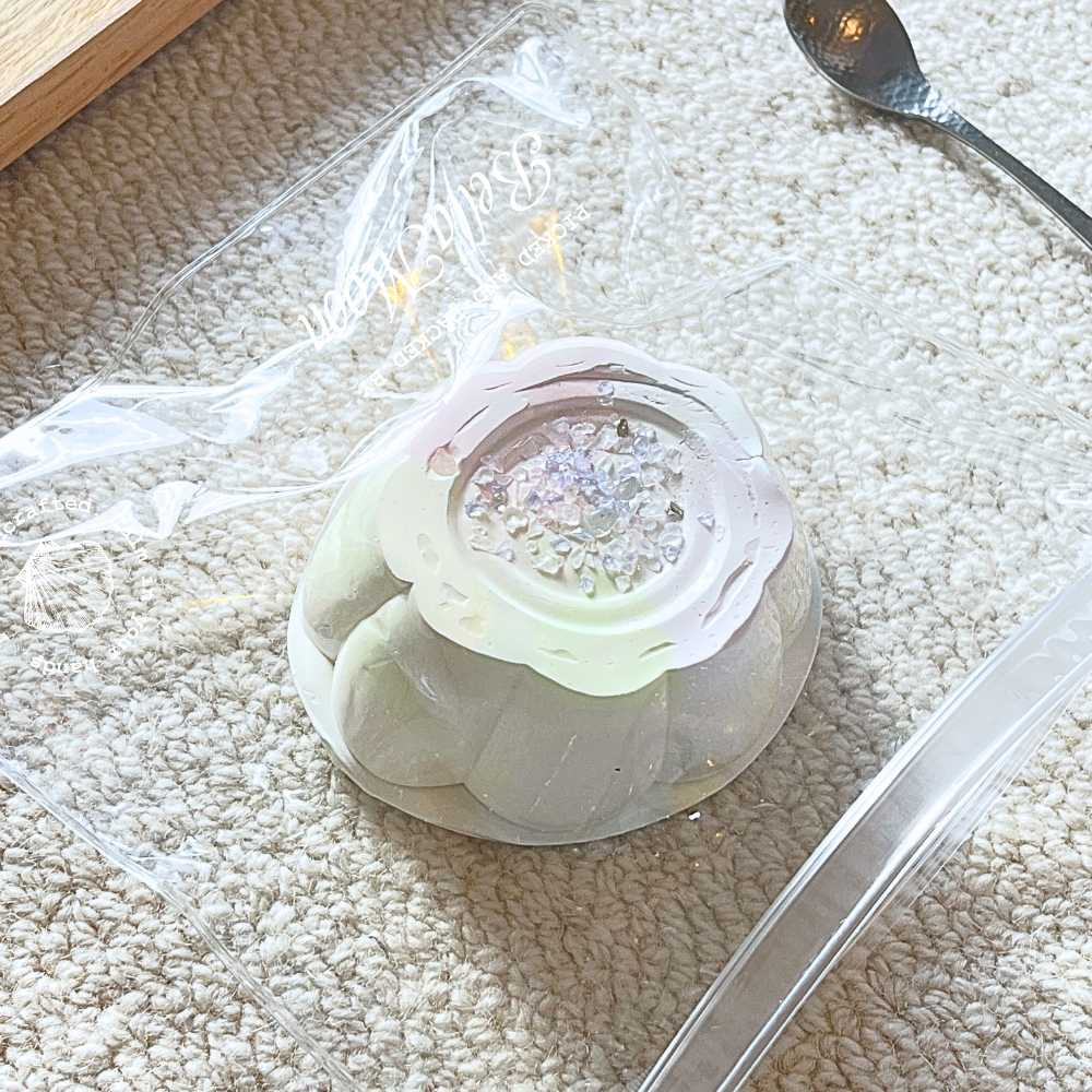 Pink yogurt silk pudding squishy toy with Greek yoghurt texture, heaviest in collection at 279g, designed for intensive sensory regulation and autism support