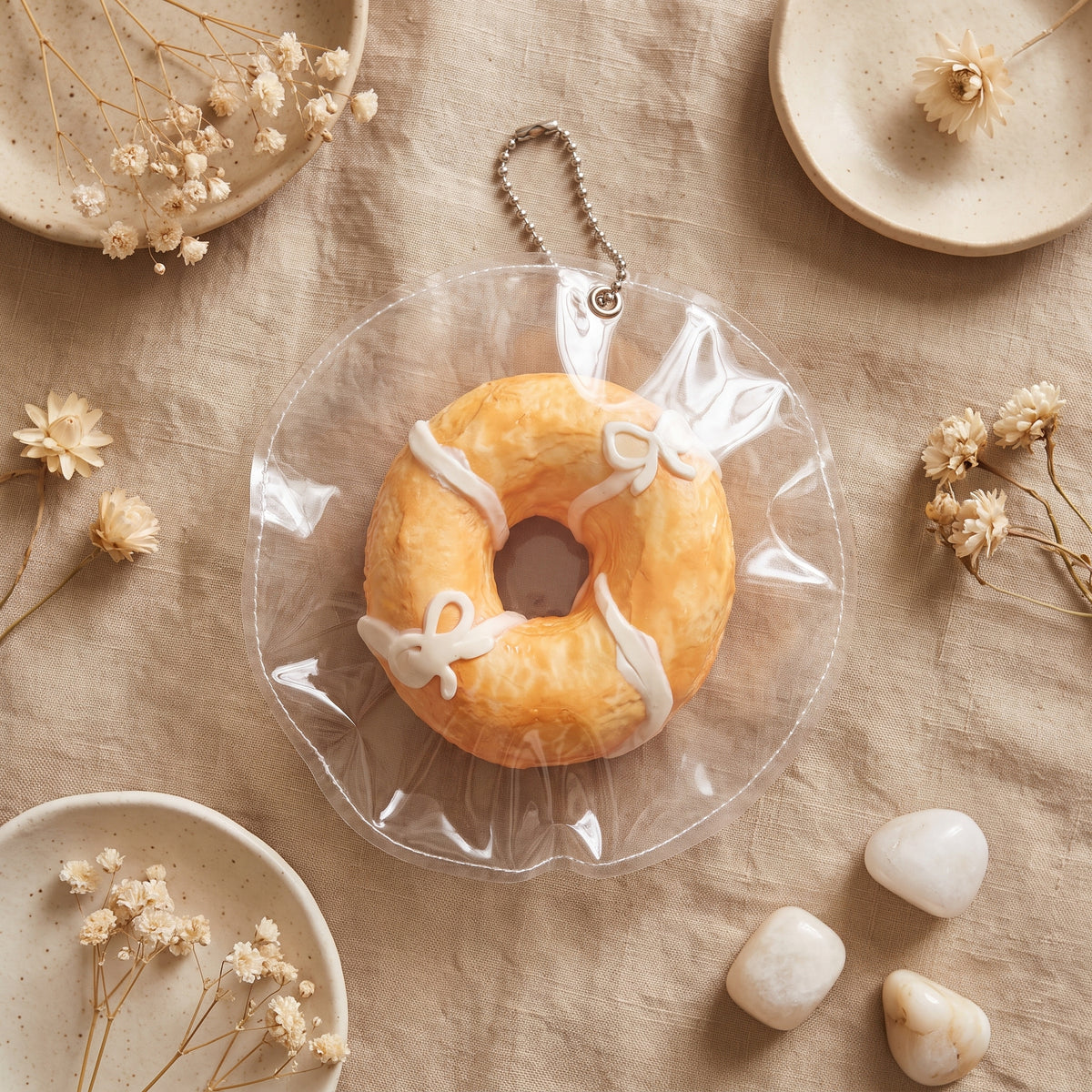 Bow donut TABA squishy with Greek yoghurt texture and ribbon bow detail, handmade slow rising stress relief squishy Australia Sydney