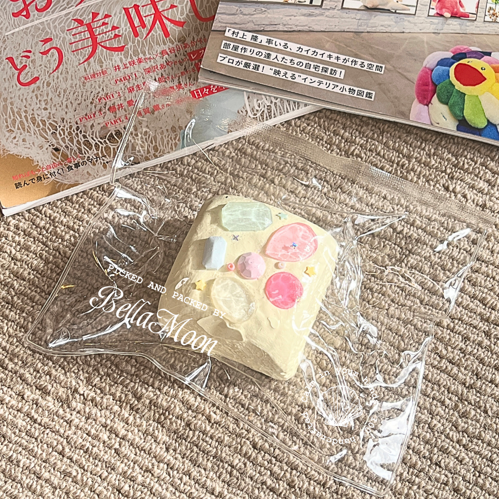 Carnival gem dinner roll TABA squishy with buttercream texture and colourful gem-like topping, handmade slow rising stress relief squishy Australia Sydney