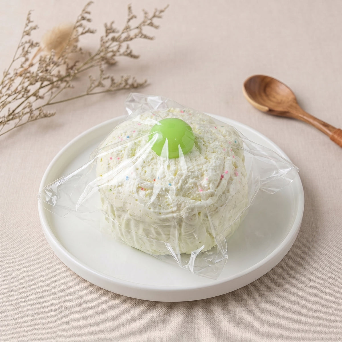 Green grape cupcake TABA squishy with whipped cream texture and pale green frosting swirl, handmade extra slow rising stress relief squishy Australia Sydney