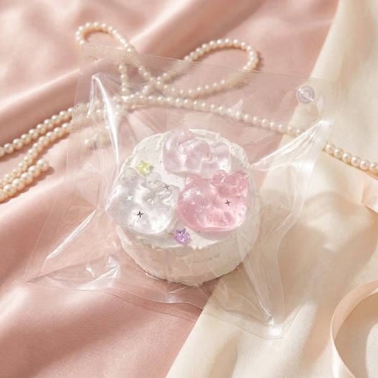 Kitty and friends frosted cake TABA squishy with buttercream texture and smooth iced finish, handmade extra slow rising stress relief squishy Australia Sydney