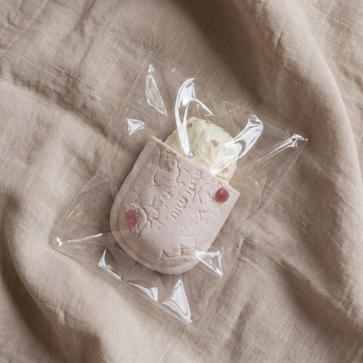 Pomegranate treasure pie TABA squishy with buttercream texture and jewel-toned seed topping, handmade slow rising stress relief squishy Australia Sydney