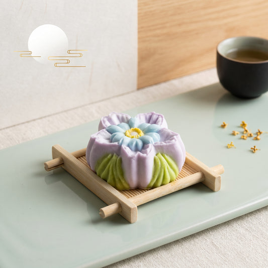 Purple gold lotus mooncake TABA squishy with stamped floral pattern and Greek yoghurt texture, handmade slow rising stress relief squishy Australia Sydney