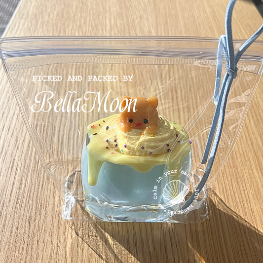 Bear Pudding Cup squishy with pink jiggly gel texture, wobbly animal dessert stress relief toy