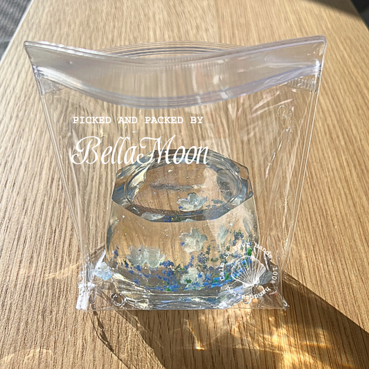 Bluey Blossom Cup squishy with jelly gel texture in dreamy purple, floral stress relief toy
