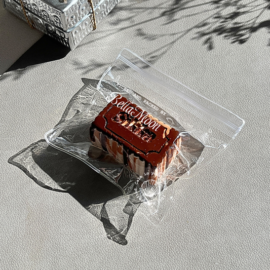 Chocolate brown butter block squishy with nougat-like texture and slow rise for indulgent stress relief