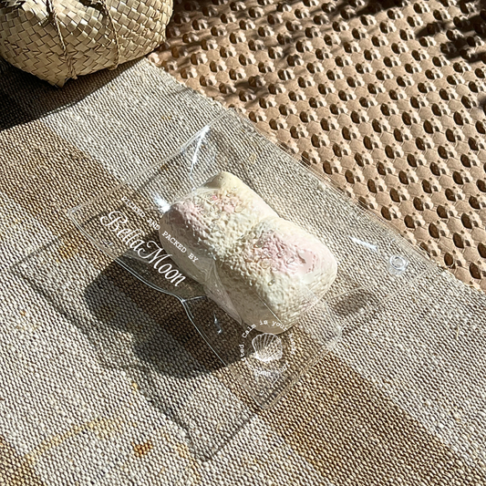 Delicate pink marshmallow squishy with dry yogurt texture and extra-slow rise for sensory comfort and playful stress relief