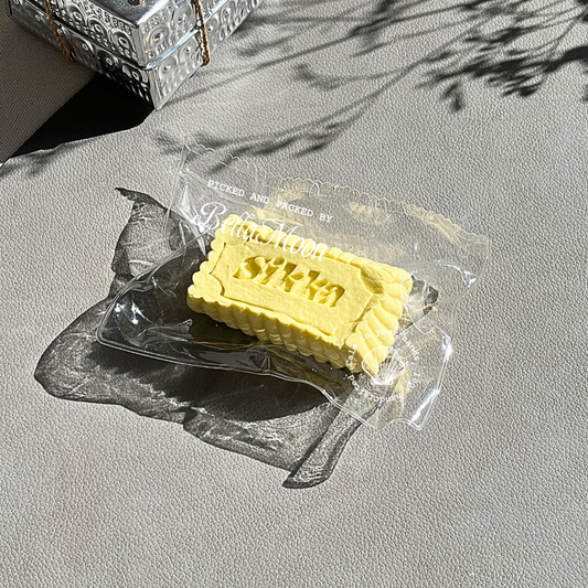 Golden butter block squishy with slow-rising creamy softness for warming stress relief and tactile comfort