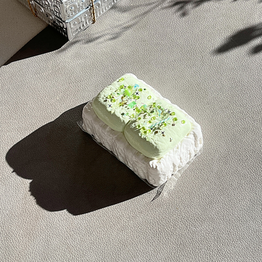 Green buttercream marshmallow squishy with mocha tones and extra-slow rise for calming mood elevation