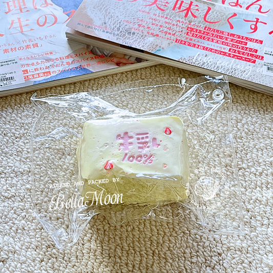 Strawberry milk cake slice squishy with buttercream texture, 196g creamy white design evoking comfort food associations for stress relief
