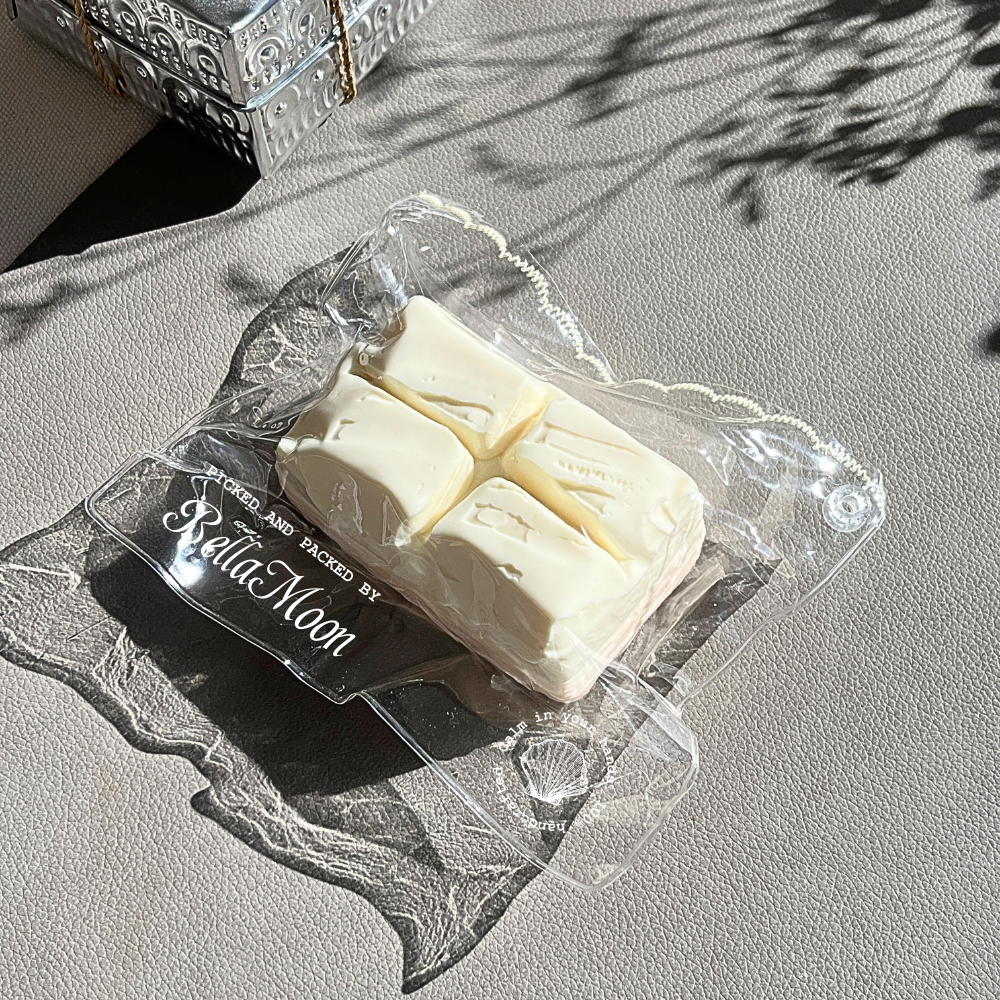 Milky white peach chocolate block squishy with extra-slow rising dough texture for sweet calming fidget therapy